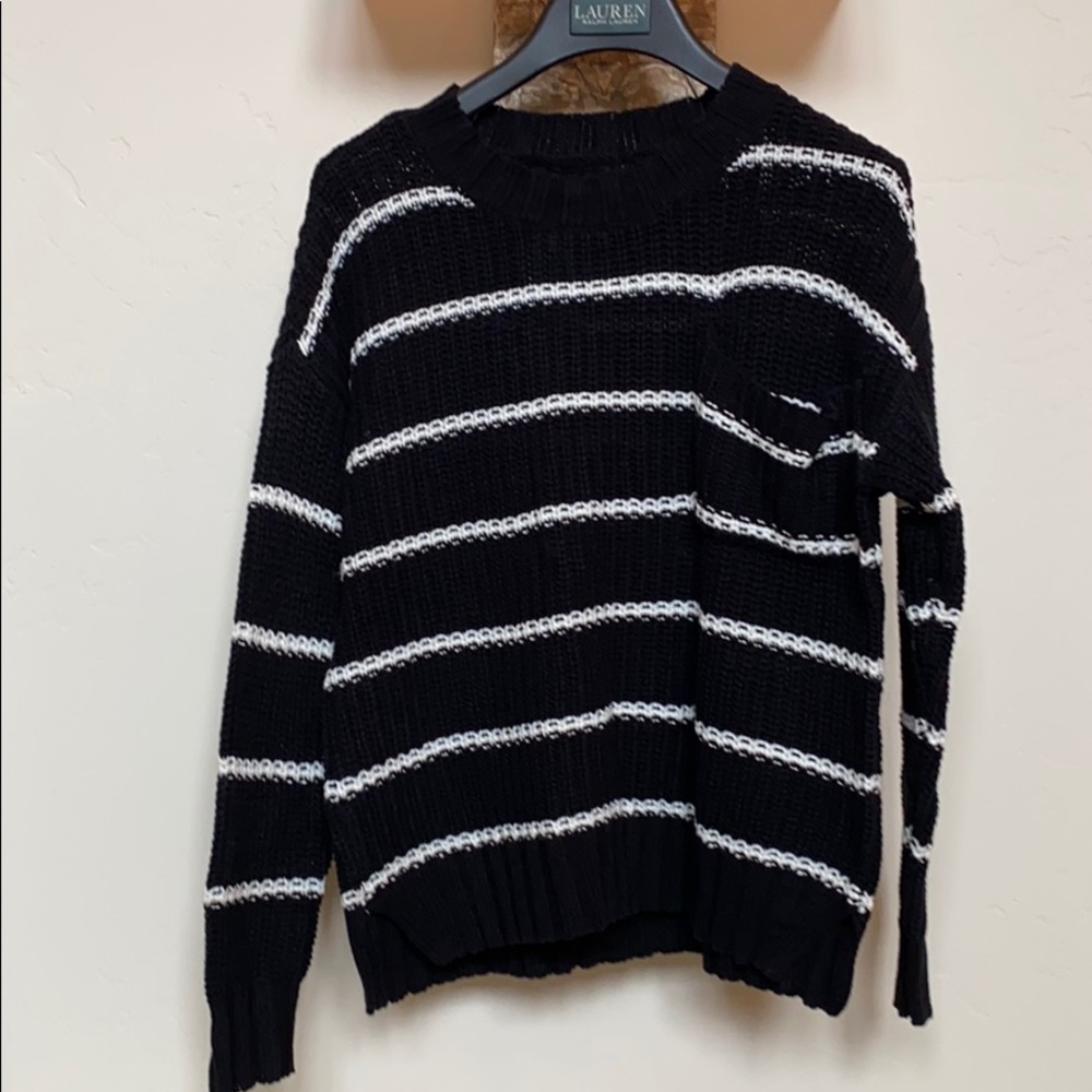 Black and white striped sweater.
